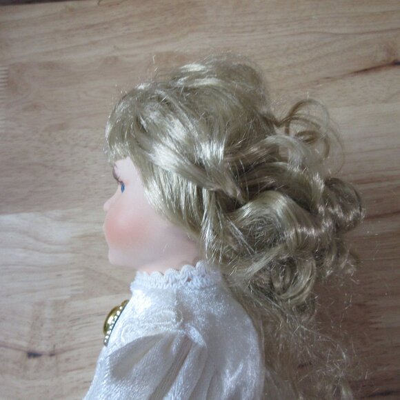 Americana Collection 17" Porcelain Doll - Isabel Christmas Doll - Picture 8 of 9